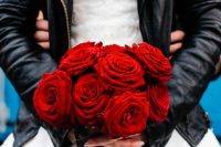 a red rose Valentine’s Day wedding bouquet is a refined and chic idea for a bride