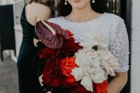 a refined color block wedding bouquet of burgundy, red and creamy blooms is a bold Valentine statement