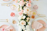 a sweet Valentine’s Day wedding table with an ombre floral table runner, blush plates and napkins and gold cutlery is beautiful