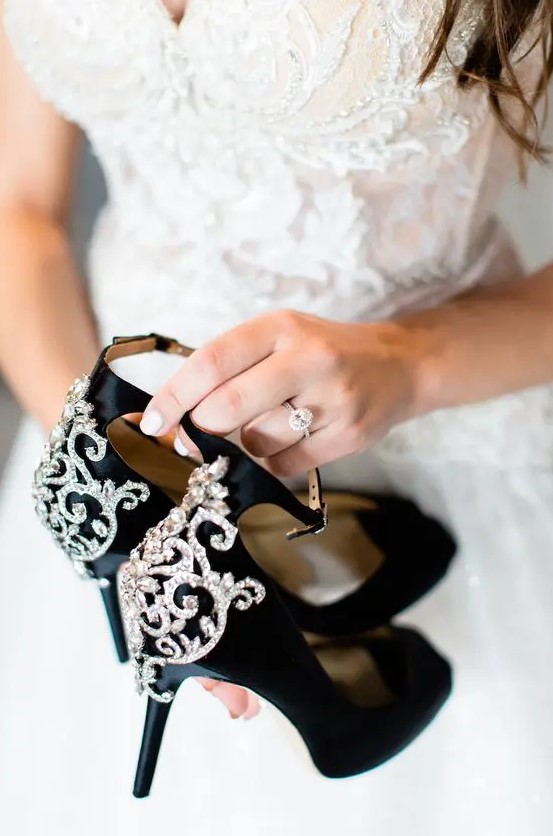 black shoes with embellishments and high heels plus ankle straps and peep toes are an amazing idea for a Halloween wedding