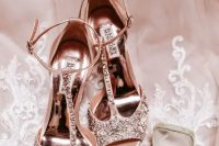 blush heavily embellished T strap wedding shoes with peep toes are amazing for a glam bridal look and will bring a soft touch of color