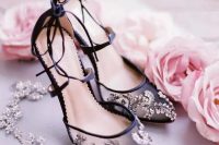 exquisite semi sheer black shoes with beautiful rhinestone and pearl embroidery plus laces are amazing for a refined bride