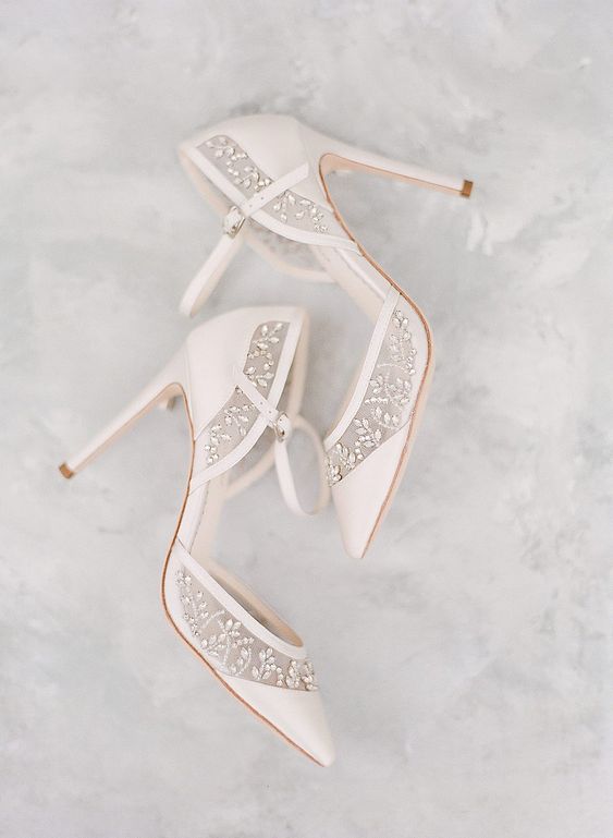 neutral super delicate wedding shoes with straps and lovely embellishments with a botanical pattern are gorgeous