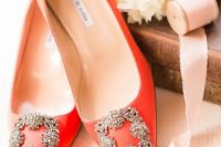a lovely pair of orange wedding shoes
