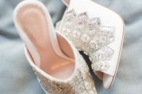 white heavily embellished mules for a fashion-forward bride who wants a touch of bling
