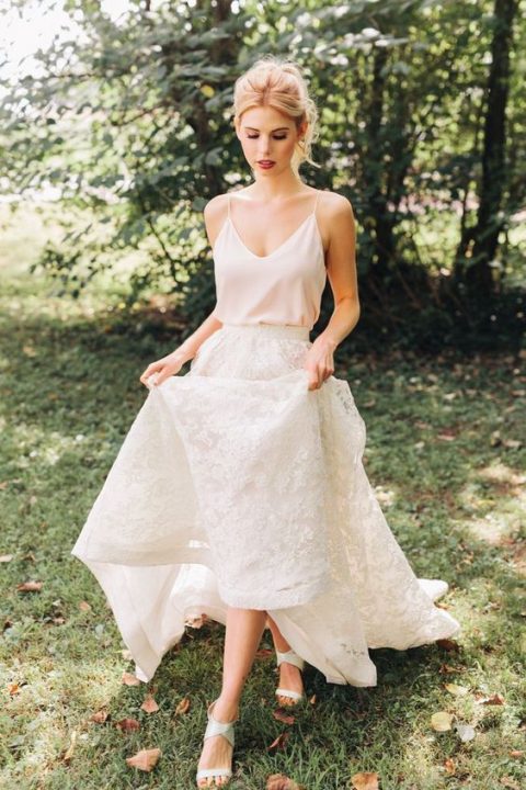 a blush spaghetti strap top and a white lace A-line maxi skirt and neutral heels for a modern or casual bride