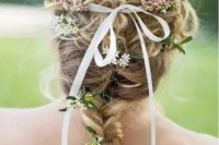a lovely hairstyle with a thin ribbon