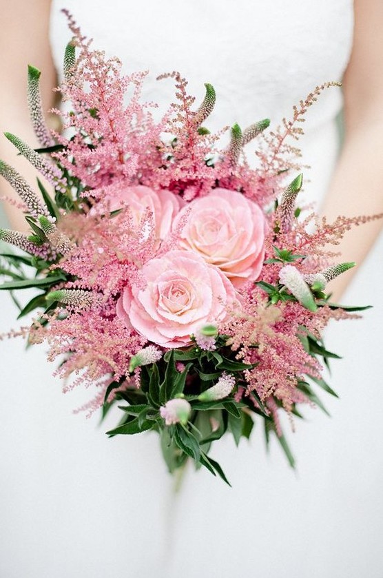 a bright and cool wedding bouquet with pink blooms and astilbe plus greenery is a vivacious and fun idea