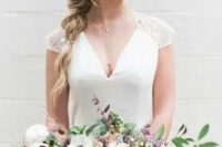 a delicate twisted braid with some bangs looks very chic and subtle, it’s perfect for boho brides and can be accessorized with blooms