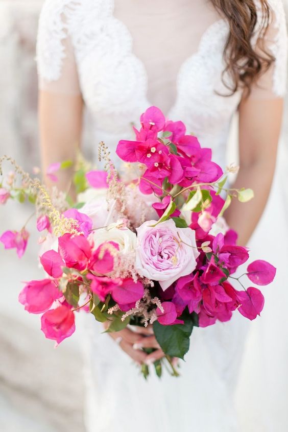 a fuchsia and light pink wedding bouquet will be your bright statement and a bold touch of color for a spring or summer wedding