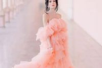 a gorgeous pink layered tulle off the shoulder wedding dress with a train plus statement earrings for a super girlish look