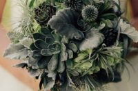 a greenery wedding bouquet with succulents, allias, foliage, air plants and grasses shaped as a ball