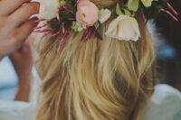 a half updo with twists and waves, with frehs neutral and pastel blooms tucked in is a great idea for a spring or summer boho bride