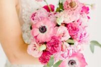 a hot pink wedding bouquet with greenery is a gorgeous idea for a berry-hued or pink wedding