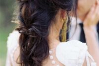 a loose and twsited braid with a volume on top and some locks down looks very sophisticated and chic