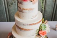 a naked wedding cake decorated with pink and white blooms, greenery and succulents, berries is a lovely idea for a spring or summer wedding