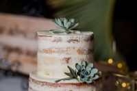 a naked wedding cake decorated with succulents is a lovely idea for a rustic or some other wedding, it looks cool