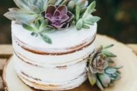 a naked wedding cake topped with succulents to give it a modern rustic look is a lovely idea for a laid-back wedding