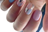 a pastel wedding manicure with pink, peachy pink, blue nails and touches of watercolor and gold foil is amazing