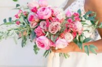 a pink wedding bouquet of roses, peony roses and carnations plus greenery is a gorgeous idea for a bold wedding