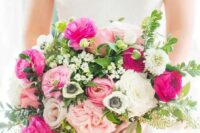 a refined and contrasting wedding bouquet of white, light and hot pink blooms, greenery and bouquet fillers is a lovely idea