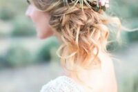 a twisted side updo with waves and airplants is a cool solution because they won’t wither