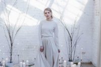 a white cashmere jumper plus an off-white A-line skirt lets a minimalist bride feel comfortable