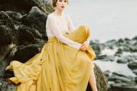 a white lace crop top and a yellow full skirt with a train to make a gorgeous color statement at the wedding