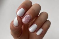 a white wedding manicure with a pink nail with silver and white polka dots is a brilliant idea for spring and other seasons