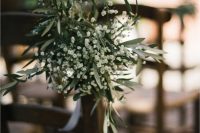 baby’s breath and fresh greenery arrangement is amazing to decorate the wedding aisle for a spring or summer wedding