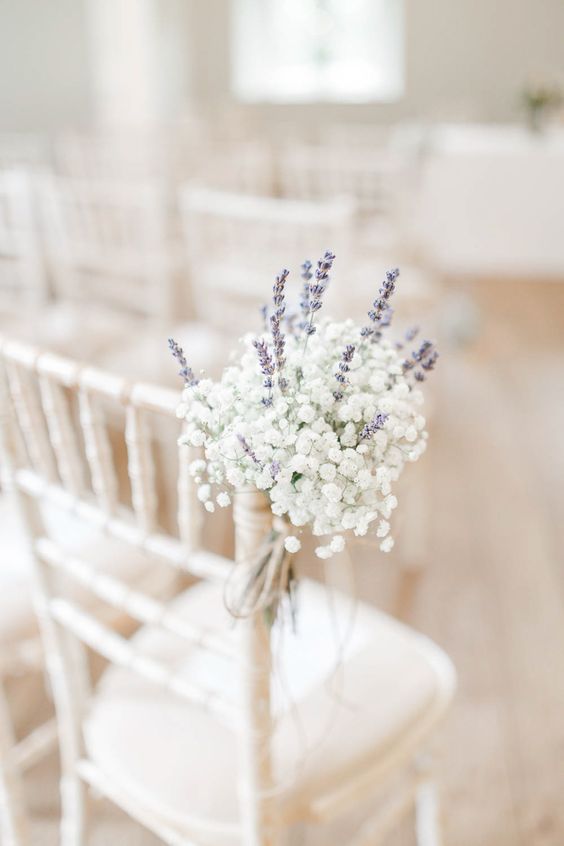 baby's breath and lavender arrangements are great to style the wedding aisle for a spring or summer wedding
