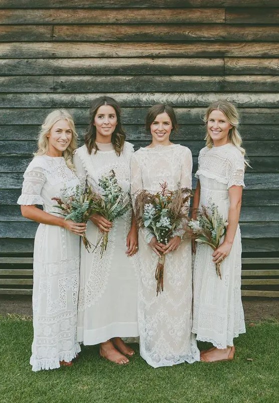beautiful mismatching white boho lace midi bridesmaid dresses with vintage detailing are a lovely and beautiful idea for a boho wedding
