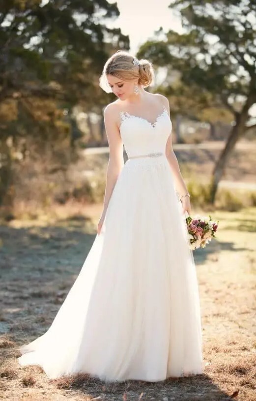 chic A-line sleeveless wedding dress with an illusion neckline, an embellished belt and a plain skirt