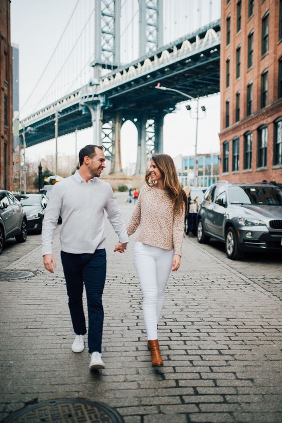 cool cohesive looks and a great city-style backdrop will make your engagement pics unforgettable