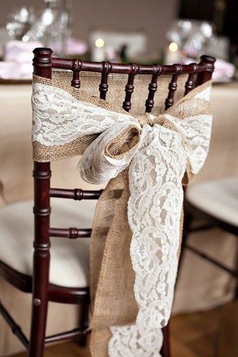 decorate wedding chairs with burlap and lace bows instead of traditional signs and plaques