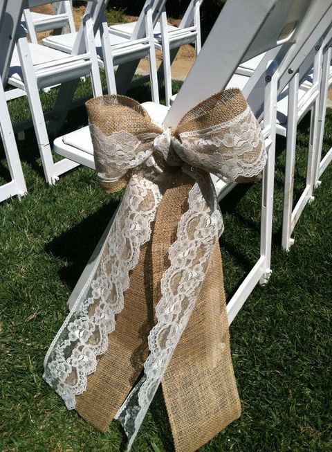 decorate your wedding aisle chairs with burlap and lace bows to make them look chic and cool