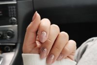 dusty pink nails with a bit of glitter is a beautiful idea of a wedding manicure, with a touch of glam and shine