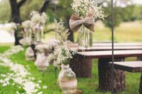 jars and bottles wrapped with burlap and lace and with burlap and lace bows and pearls are amazing for wedding decor