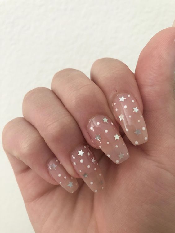 long nude nails with white polka dots and silver stars are amazing for a celestial bride in any wedding season, not only in spring