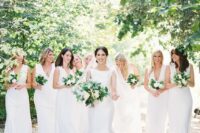 matching white semi-fitting maxi bridesmaid dresses with plunging necklines and no sleeves are amazing for neutral wedding