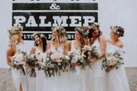 mismatched white bridesmaids’ dresses with all kinds of necklines and slits for a fresh summer feel