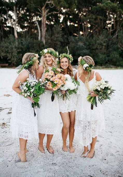 mismatched white lace bridesmaid dresses for a boho beach wedding in neutral colors