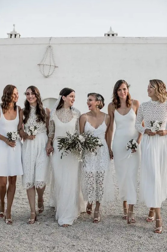 mismatching boho lace and plain white bridesmaid dresses will let each bridesmaid express her style and choose the best look