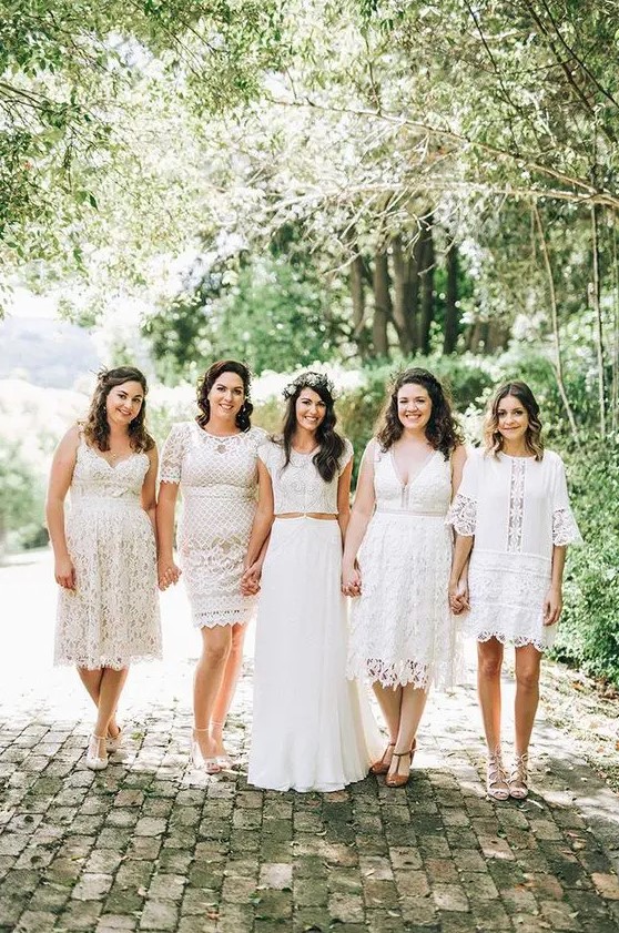 mismatching white boho lace knee and mini bridesmaid dresses with various necklines, silhouettes and sleeves to look ultimate