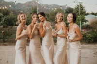 neutral silk slip midi bridesmaid dresses are chic, simple and will never go out of style