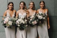 shiny white high low midi bridesmaid dresses with thick straps and pluning necklines and statement earrings