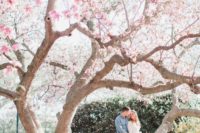 sit on a blooming tree to make your spring engagement more season-embracing