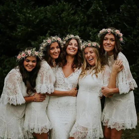 white lace turmpet bridesmaid dresses with short sleeves and V-necklines are ideal for a spring or summer boho weddings