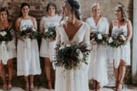 white mismatched bridesmaid dresses with a lace edge, tassels and fringe for a neutral summer wedding