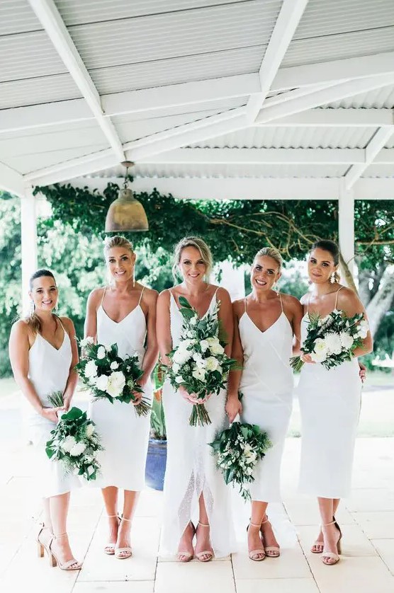 white slip midi bridesmaid dresses plus nude shoes are a cool and chic combo and the gals won't overheat in such flowy dresses